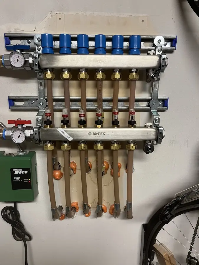 Plumber performing Leak Detection at a residential property in Smithville-Sanders